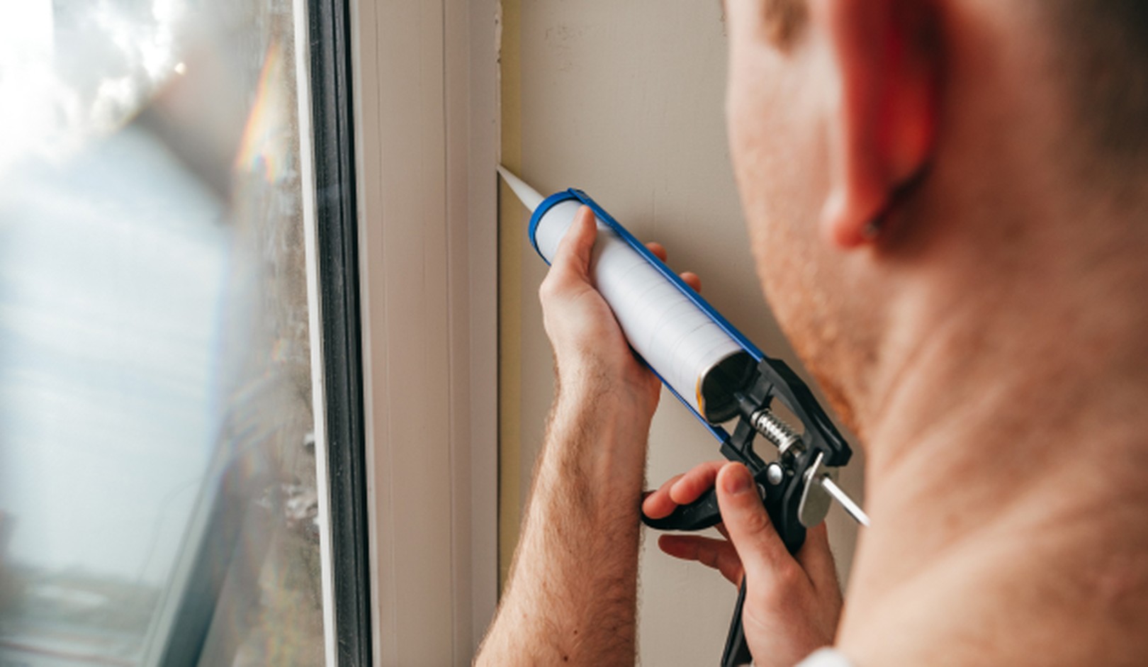 Caulking window gaps